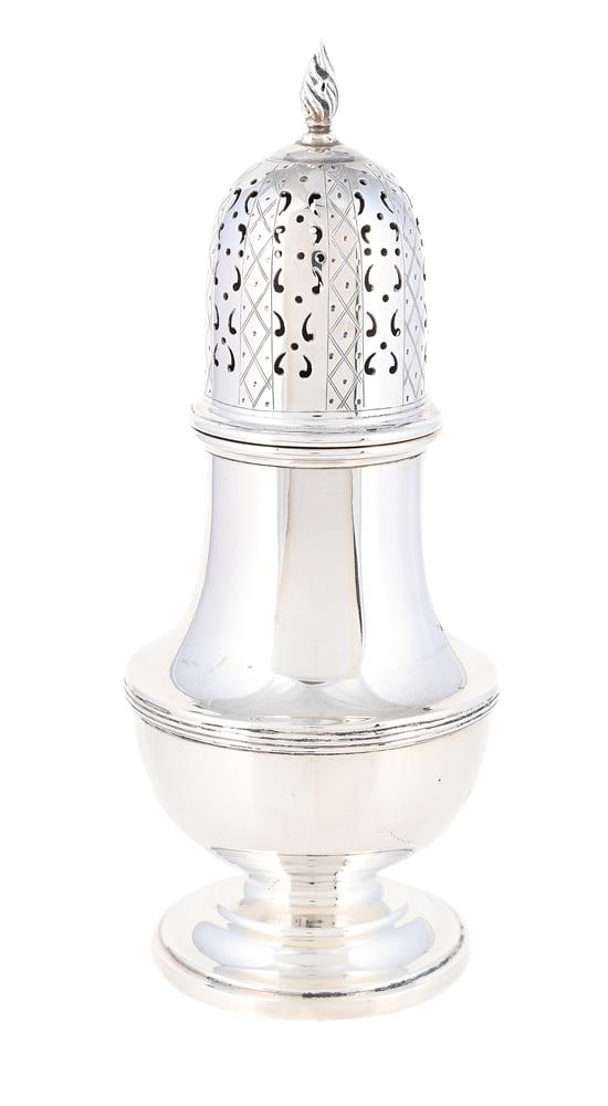 A SILVER BALUSTER SUGAR CASTER: A SILVER BALUSTER SUGAR CASTER SYNYER & BEDDOES, BIRMINGHAM 1929 With a flame finial to the pierced domed cover, a reeded girdle and on a circular moulded spreading foot 19.5cm long 219g (7.05