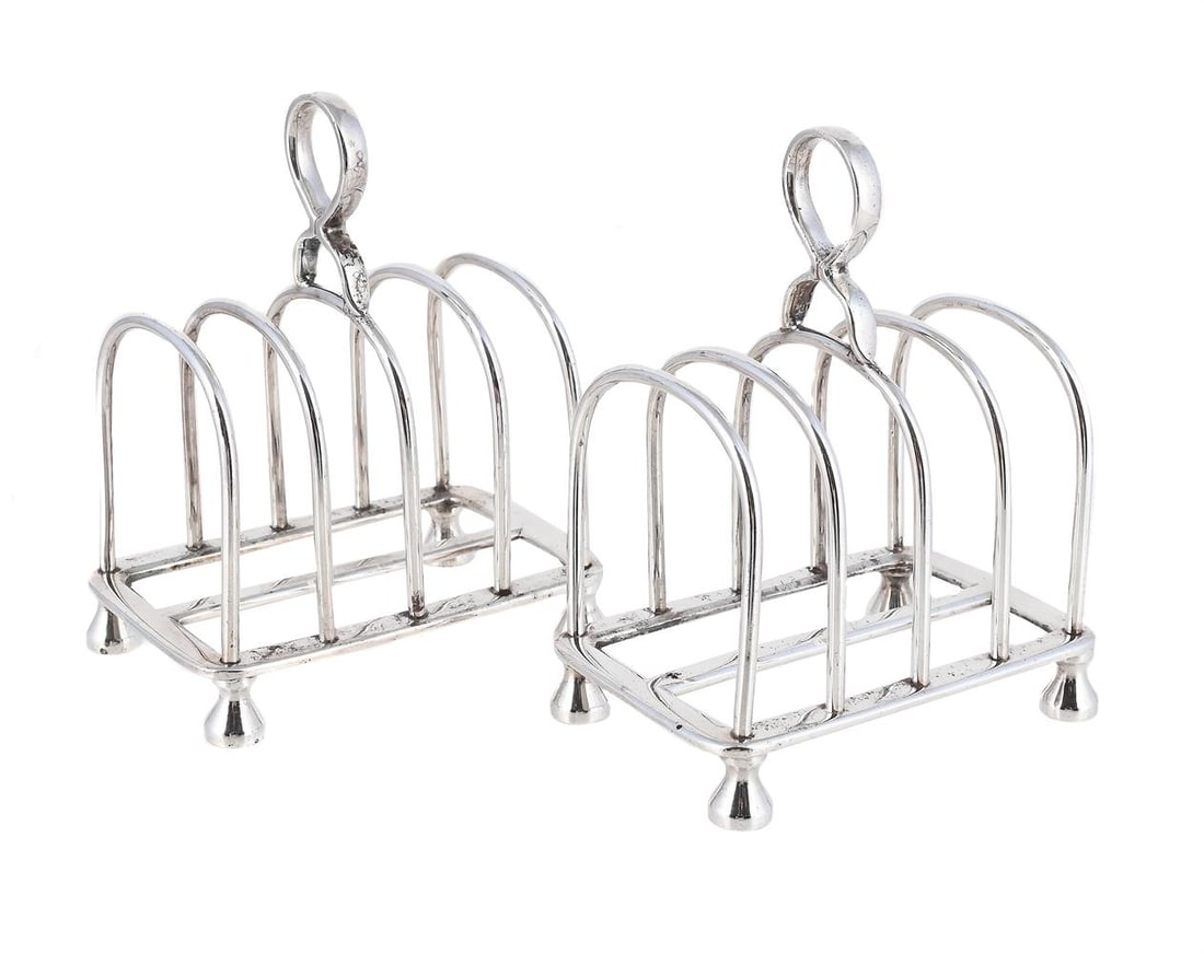 A PAIR OF SILVER FOUR DIVISION TOAST RACKS: A PAIR OF SILVER FOUR DIVISION TOAST RACKS