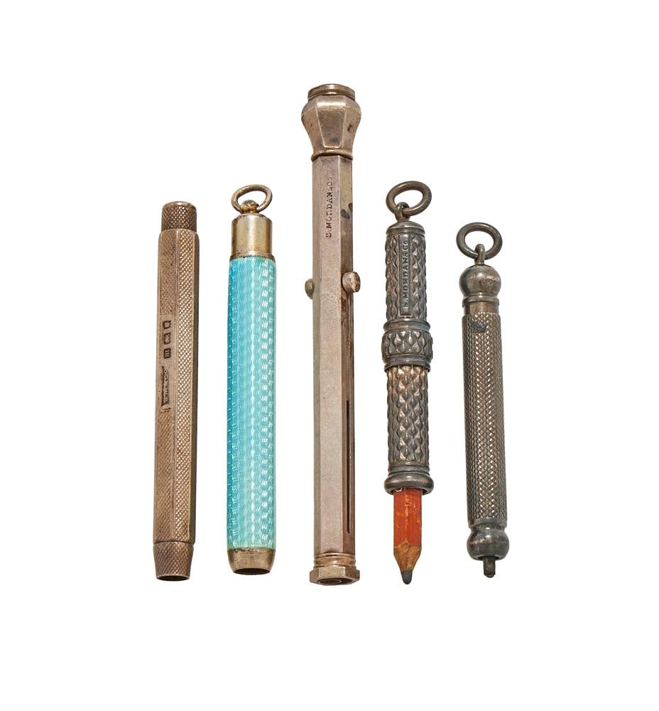 FIVE PROPELLING PENCILS: A SILVER COMBINATION PROPELLING PENCIL AND DIP PEN S. MORDAN & CO. With a bloodstone seal matrix carved W. C 9.5cm long Together with: A SILVER PROPELLING PENCIL S. MORDAN & CO., LONDON 1927