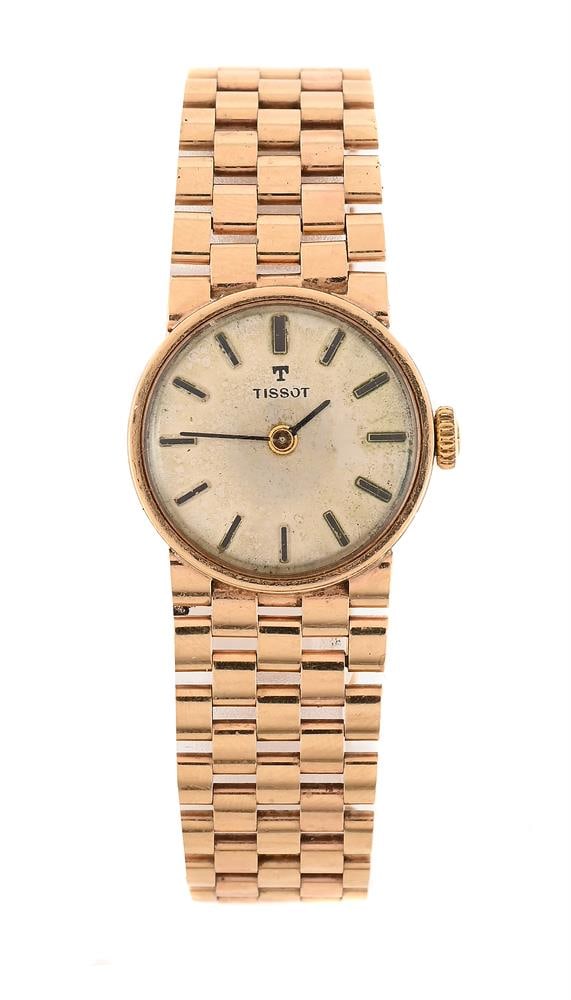 TISSOT, REF. 1061, A LADY'S 9 CARAT GOLD BRACELET WATCH: TISSOT, REF. 1061 A LADY'S 9 CARAT GOLD BRACELET WATCH, NO. 76201, BIRMINGHAM 1970 Movement: Manual wind Case: 9 carat gold case, snap case back Dial: Silvered Bracelet: Integral 9 carat gold
