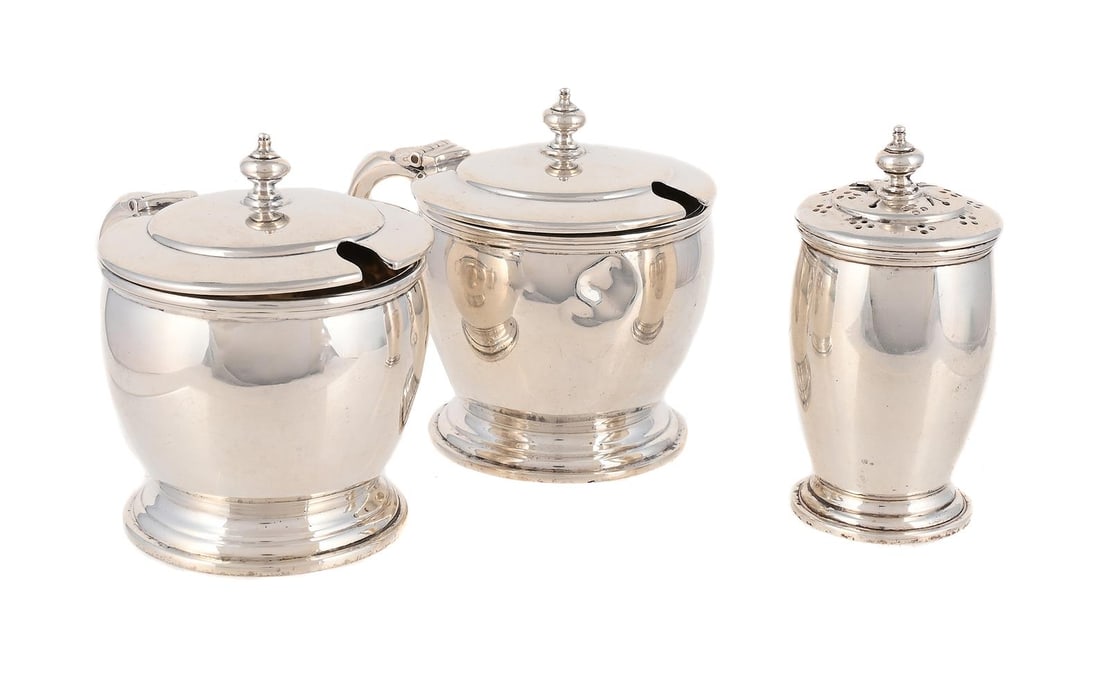 A SILVER THREE PIECE CRUET SET: A SILVER THREE PIECE CRUET SET WAKELY &