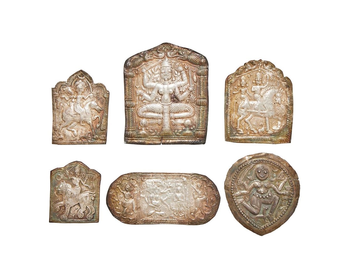 SIX SOUTH INDIAN SILVER PANELS: SIX SOUTH INDIAN SILVER PANELS UNMARKED Chased with Hindu Vedic images 5cm to 8.5cm high 55g (1.75 oz) gross