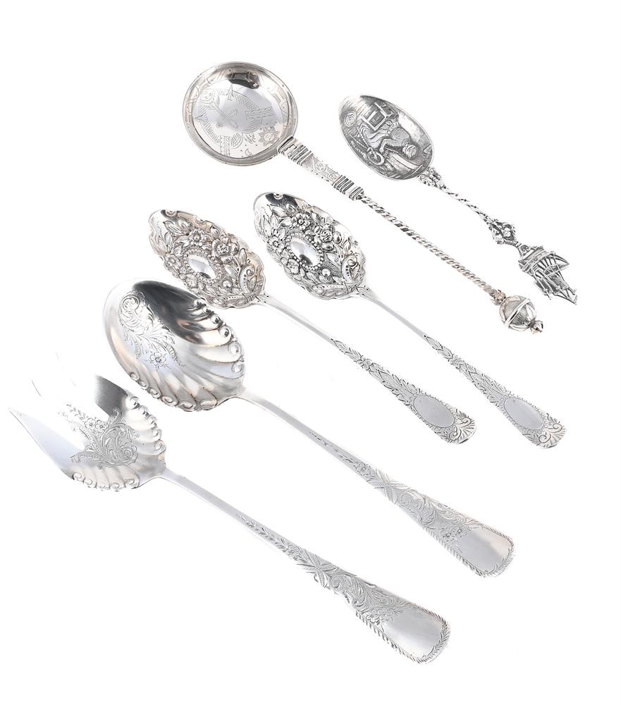 A COLLECTION OF SILVER FLATWARE: A PAIR OF VICTORIAN SILVER BERRY SPOONS JOHN ALDWINCKLE & THOMAS SLATER, LONDON 1894 The shaped bowls chased with flowers, the handles engraved with foliage and oval vacant reserves 22.5cm long