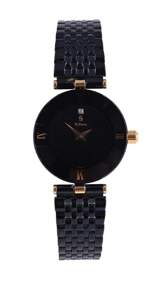 H. STERN, A LADY'S SAPPHIRE GLASS AND STAINLESS STEEL BRACELET WATCH: H. STERN A LADY'S SAPPHIRE GLASS AND STAINLESS STEEL BRACELET WATCH Movement: Cal. ETA 280.002, quartz, 5 jewels Case: Stainless steel case, sapphire glass bezel, screwed down case back with four