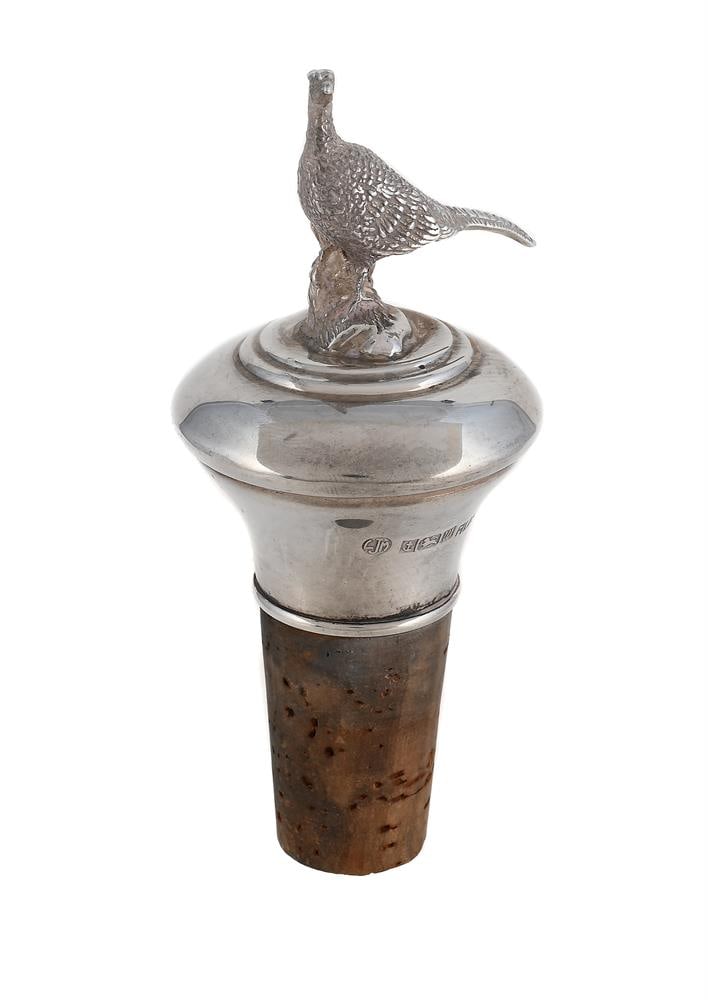 A SILVER MOUNTED BOTTLE STOPPER: A SILVER MOUNTED BOTTLE STOPPER L. J. MILLINGTON, BIRMINGHAM 1996 With a pheasant finial 9cm high