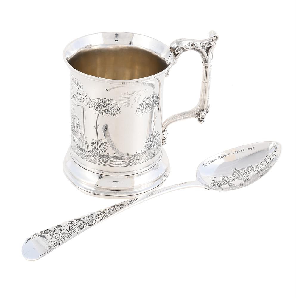 A VICTORIAN SILVER MUG AND A SCOTTISH DESSERT SPOON: A VICTORIAN SILVER MUG H. J. LIAS & SON, LONDON 1853 With a capped scroll handle, engraved 'To Willie from Uncle Jim, 21 January 1857' 9.5cm high Together with: A GEORGE III SCOTTISH
