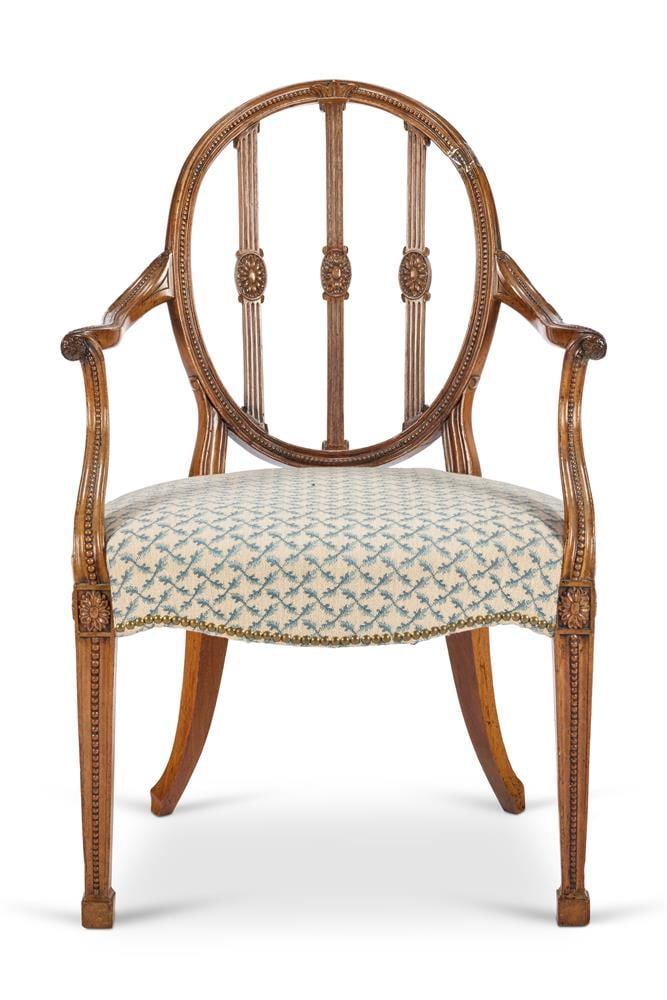 A GEORGE III CARVED MAHOGANY ARMCHAIR, DESIGN BY JAMES WYATT, CIRCA 1790 (1 of 3)