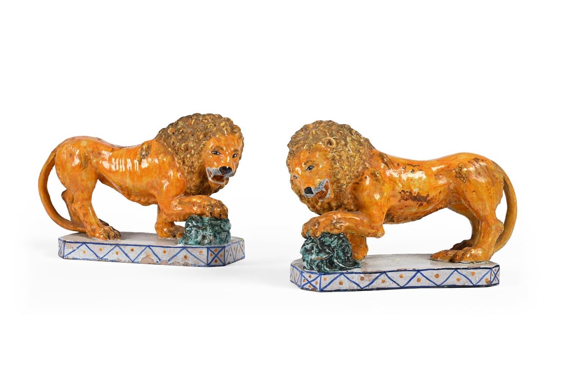 A PAIR OF SICILIAN MAIOLICA POTTERY FIGURES OF MEDICI LIONS, MODERN: A PAIR OF SICILIAN MAIOLICA POTTERY FIGURES OF MEDICI LIONS MODERN Possibly Caltagirone 21.5cm high, 31cm wide, 11.5cm wide approximately Condition Report: PLEASE NOTE: ALL LOTS ARE LOCATED AT