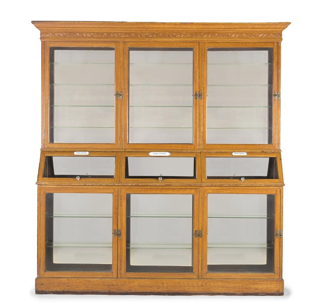 A SCUMBLED PINE AND GLASS PHARMACY OR HERBALISTS SHOP CABINET, FRENCH, CIRCA 1900: A SCUMBLED PINE AND GLASS PHARMACY OR HERBALISTS SHOP CABINET