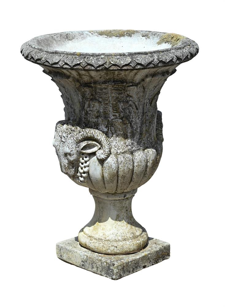A LARGE CAST STONE COMPOSITION GARDEN URN WITH RAM'S HEAD HANDLES, 20TH CENTURY: A LARGE CAST STONE COMPOSITION GARDEN URN WITH RAM'S HEAD HANDLES 20TH CENTURY 93cm high, 70cm diameter Condition Report: PLEASE NOTE: ALL LOTS ARE LOCATED AT SACKVILLE WEST STORAGE IN ANDOVER