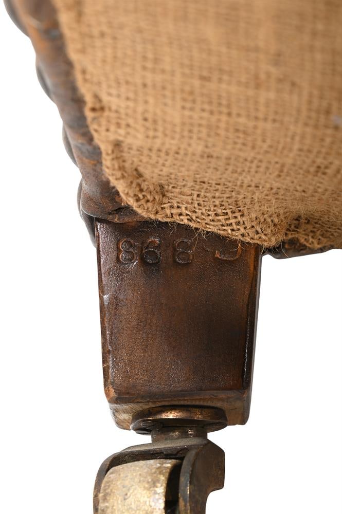 A PAIR OF EDWARDIAN BROWN HIDE UPHOSTERED WING ARMCHAIRS, BY S. J. WARING, CIRCA 1902 - 3