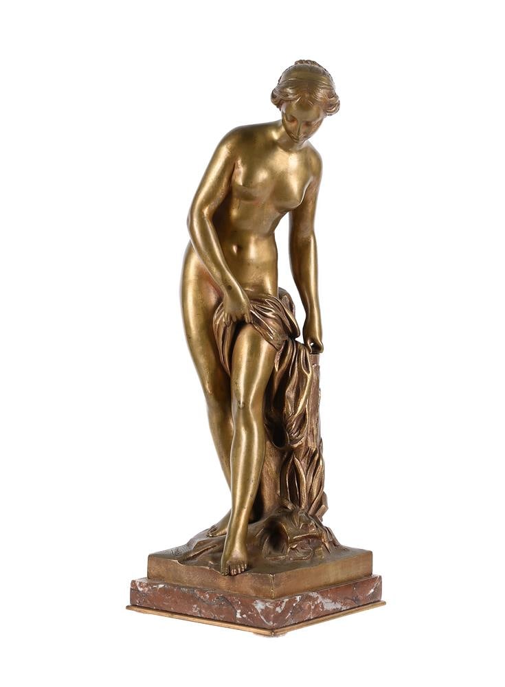 AFTER FALCONET, A GILT BRONZE FIGURE 'LA BAIGNEUSE', FRENCH, LATE 19TH CENTURY: AFTER FALCONET, A GILT BRONZE FIGURE 'LA BAIGNEUSE' FRENCH, LATE 19TH CENTURY Set on variegated red white marble base, signed to cast 42.5cm high Condition Report: PLEASE NOTE: ALL LOTS ARE