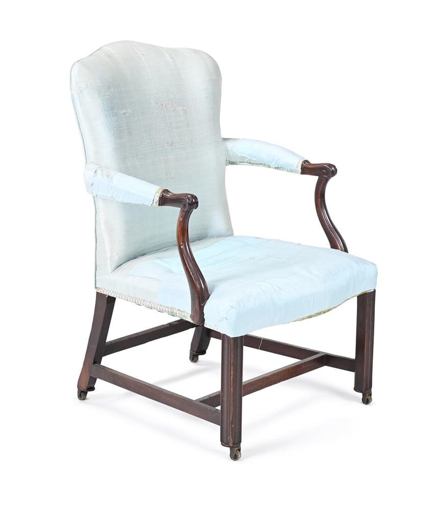 A GEORGE III MAHOGANY AND UPHOLSTERED LIBRARY ARMCHAIR, CIRCA 1765 - 2