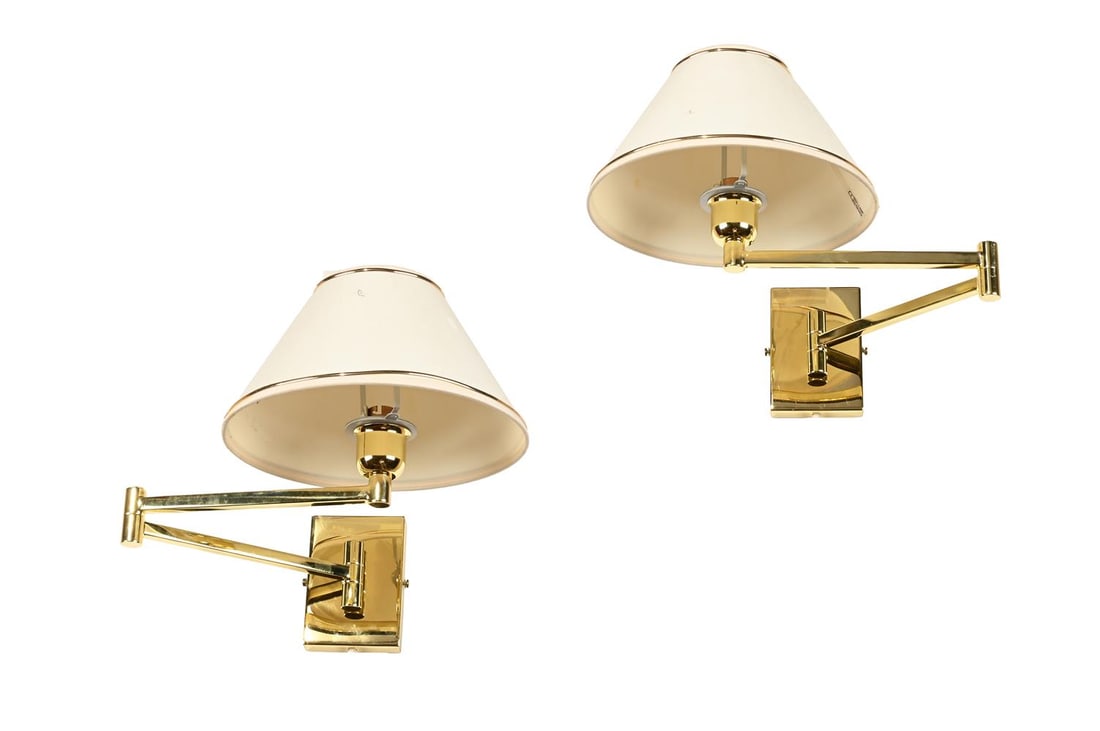 A PAIR OF LACQUERED AND BRASSED 'BILLY BALDWIN' ARTICULATED WALL LIGHTS, LATE 20TH CENTURY: A PAIR OF LACQUERED AND BRASSED 'BILLY BALDWIN' ARTICULATED WALL LIGHTS LATE 20TH CENTURY 28cm high, 35cm wide Provenance: Property of a Nobleman Supplied by Guy Oliver of Colefax &