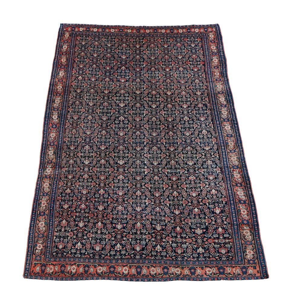 A PERSIAN FERAGHAN CARPET (1 of 4)