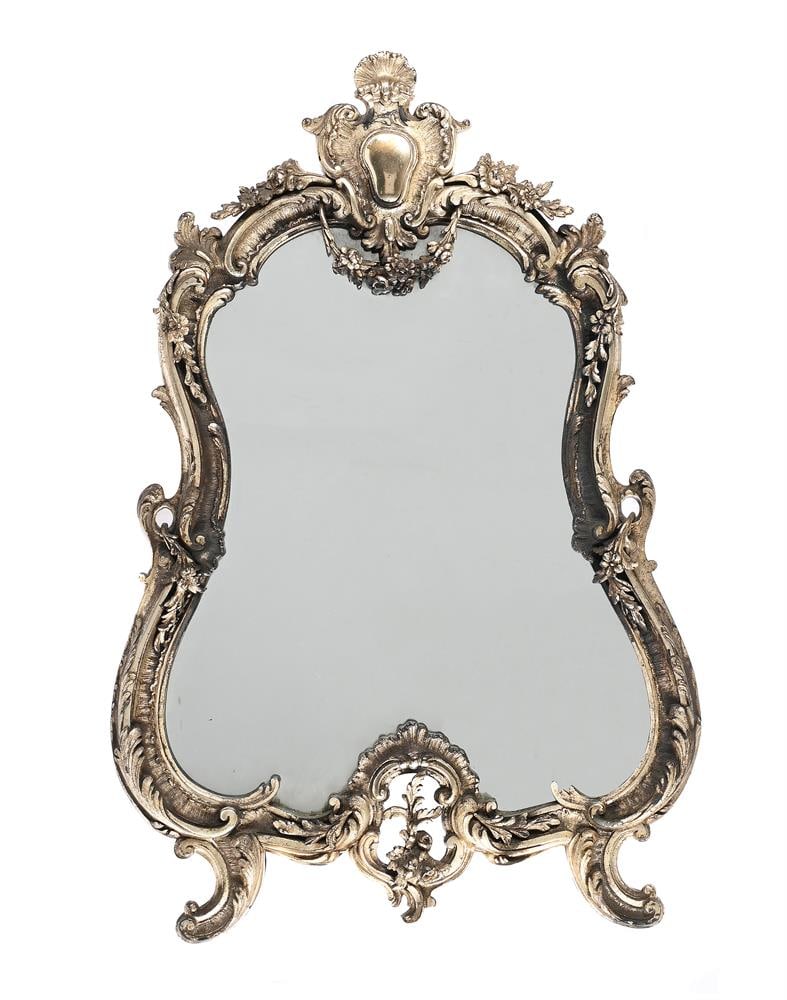 A SILVERED METAL ROCOCO REVIVAL STRUT MIRROR, LATE 19TH CENTURY: A SILVERED METAL ROCOCO REVIVAL STRUT MIRROR LATE 19TH CENTURY Stamped 29 65cm x 43.5cm Condition Report: PLEASE NOTE: ALL LOTS ARE LOCATED AT SACKVILLE WEST STORAGE IN ANDOVER (SP10 3SA) AND ARE NOT