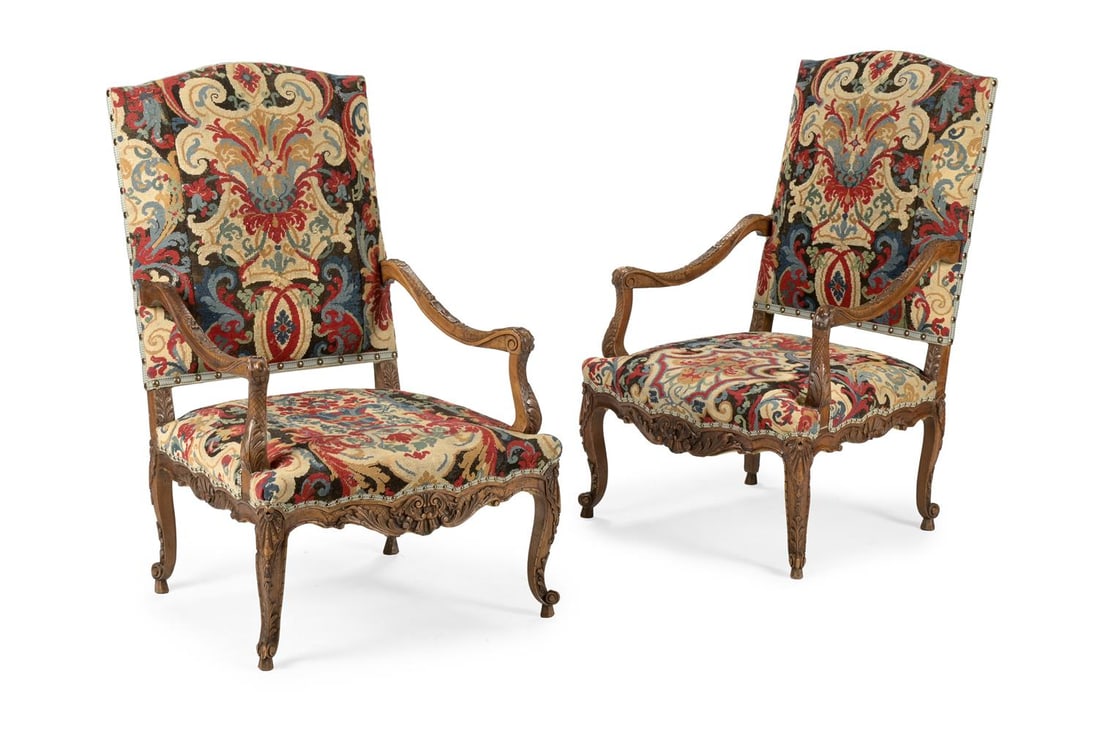 A PAIR OF CARVED WALNUT AND NEEDLEWORK UPHOLSTERED FAUTEUILS, IN REGENCE STYLE, 19TH CENTURY (1 of 4)