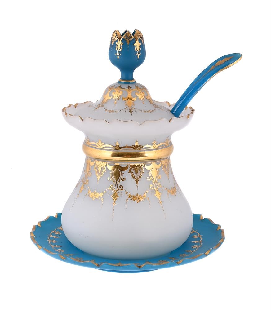 AN OPAQUE-WHITE AND BLUE FROSTED GLASS PUNCH TUREEN AND LADLE, THIRD QUARTER 19TH CENTURY: AN OPAQUE-WHITE AND BLUE FROSTED GLASS PUNCH TUREEN, COVER, STAND AND LADLE FRENCH, THIRD QUARTER 19TH CENTURY Gilt with lappet bands 39cm high Condition Report: PLEASE NOTE: ALL LOTS ARE LOCATED AT