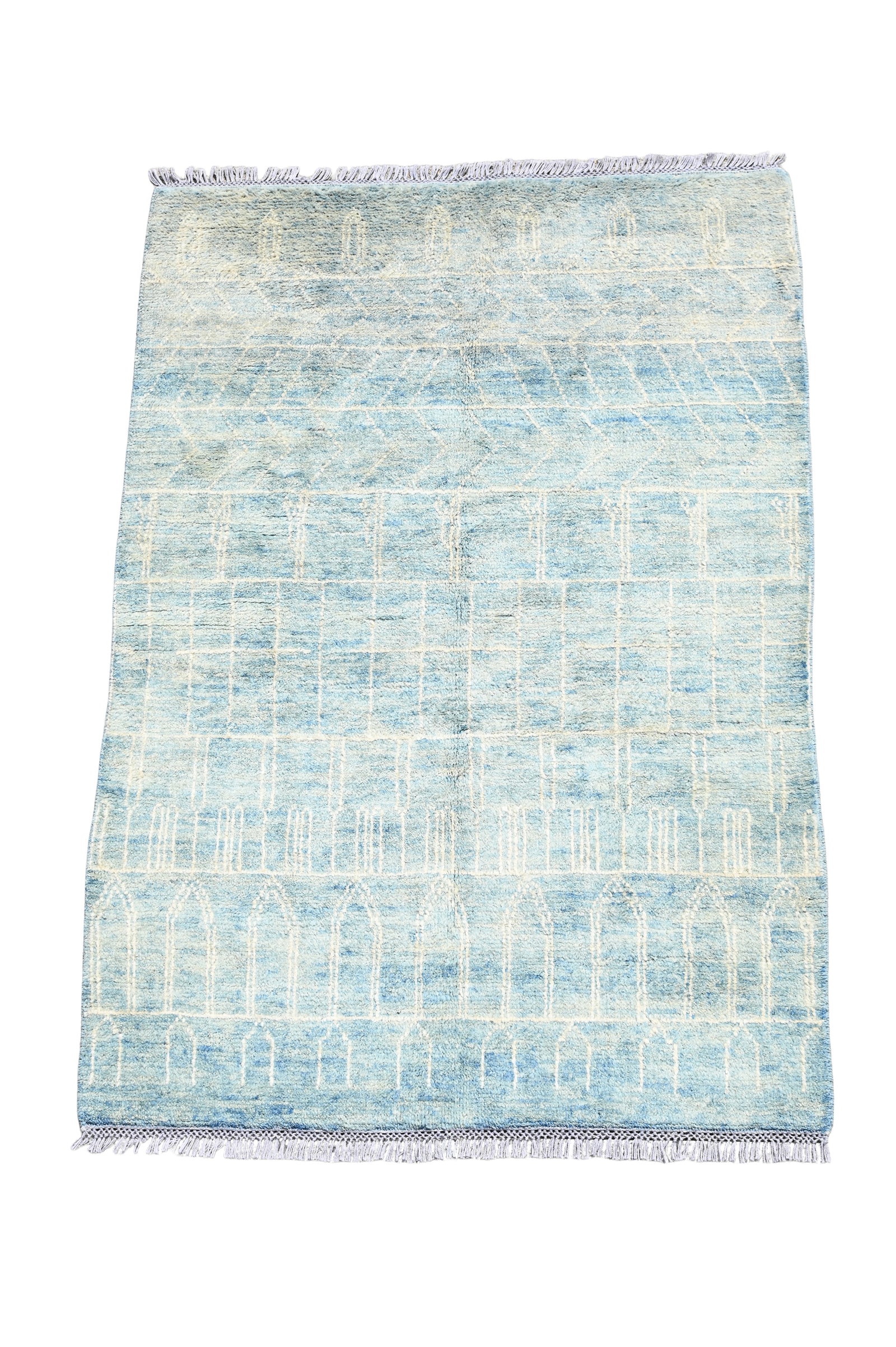 A BLUE GROUND MODERN HAND KNOTTED MOROCCAN CARPET, MODERN: A BLUE GROUND MODERN HAND KNOTTED MOROCCAN CARPET MODERN Approximately 600 x 400cm Condition Report Disclaimer