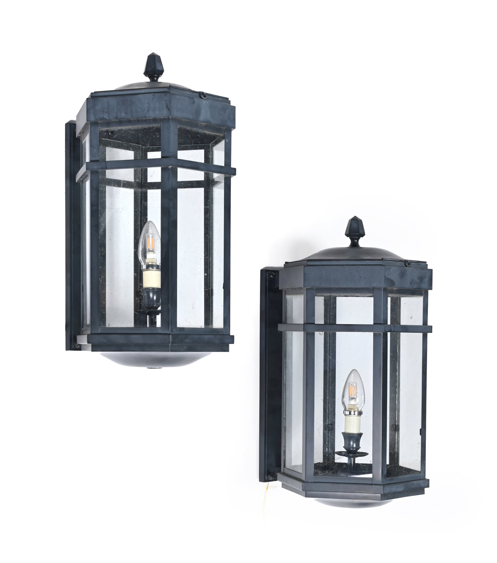 A PAIR OF METAL HEXAGONAL EXTERIOR WALL LANTERNS, IN THE ART DECO STYLE, MODERN: A PAIR OF METAL HEXAGONAL EXTERIOR WALL LANTERNS IN THE ART DECO STYLE, MODERN 50cm high, 24cm wide Condition Report Disclaimer