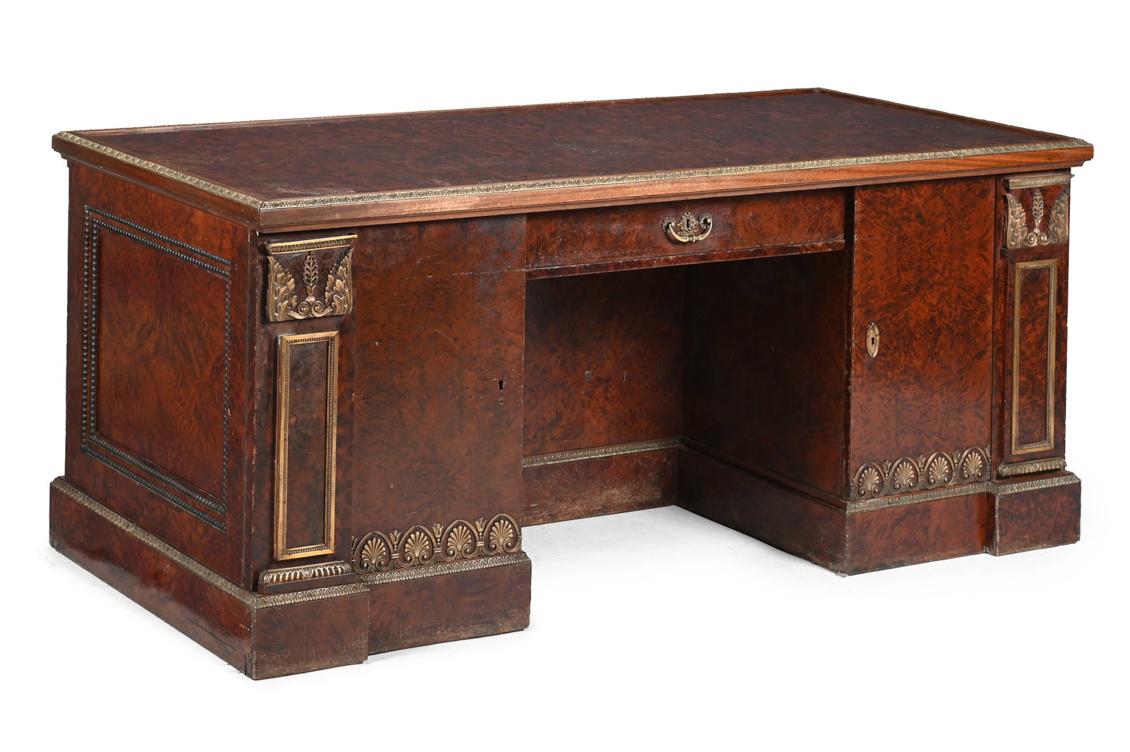 AN ITALIAN THUYA WOOD AND ORMOLU MOUNTED KNEEHOLE DESK, SECOND HALF 19TH CENTURY: AN ITALIAN THUYA WOOD AND ORMOLU MOUNTED KNEEHOLE DESK SECOND HALF 19TH CENTURY The doors enclosing shelves and sliding trays 79.5cm high, 175cm wide, 86cm deep Condition Report: PLEASE NOTE: ALL