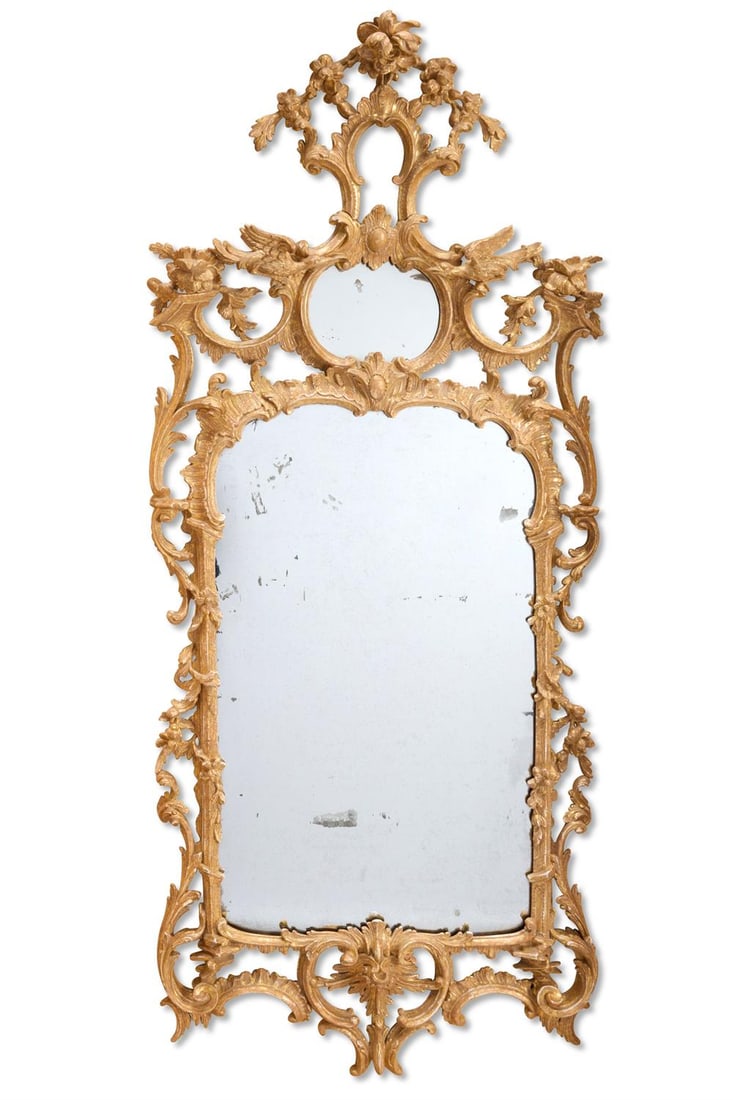 A CARVED GILTWOOD MIRROR IN THE GEORGE III STYLE (1 of 4)