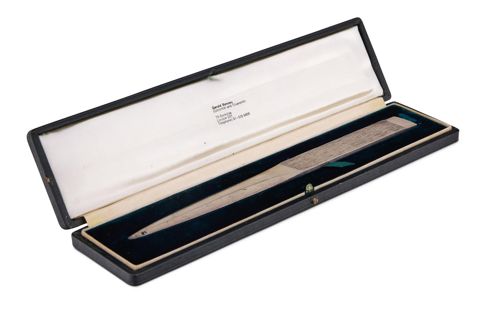 GERALD BENNEY (1930-2008), A CASED SILVER PAPERKNIFE: GERALD BENNEY (1930-2008)- A CASED SILVER PAPERKNIFE LONDON 1970 Original black case, green velvet interior with Benney Bankside address details knife 20.2cm long, 98.5g (3.1oz), case 24cm long