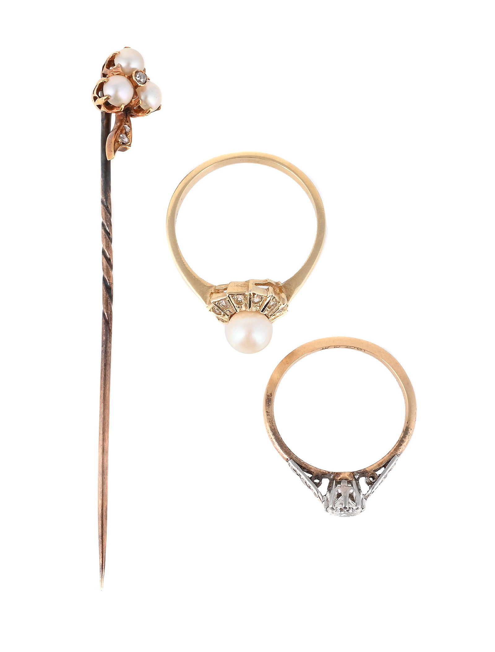 A SMALL COLLECTION OF JEWELLERY: A SMALL COLLECTION OF JEWELLERY Comprising a late Victorian half pearl and rose cut diamond clover stickpin, unmarked; a brilliant cut single stone ring, the brilliant cut diamond to an eight cut