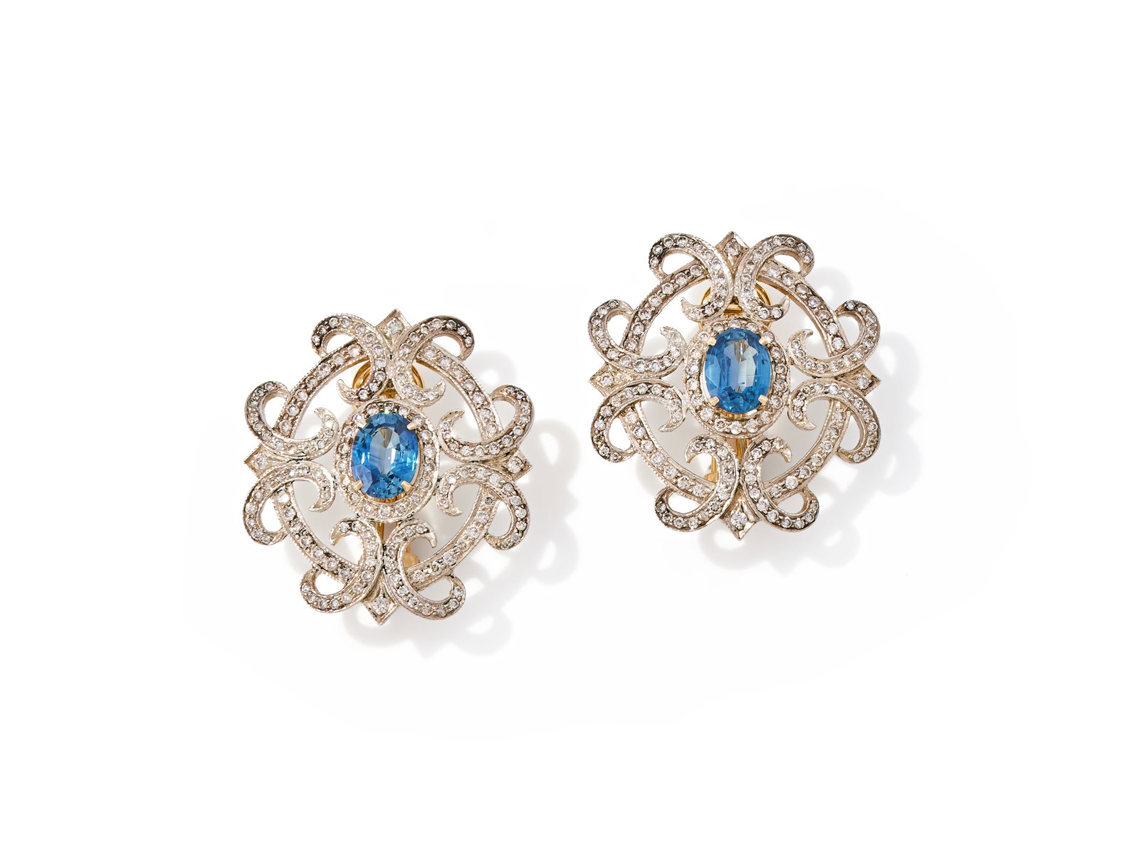 A PAIR OF SAPPHIRE AND DIAMOND EARRINGS: A PAIR OF SAPPHIRE AND DIAMOND EARRINGS The
