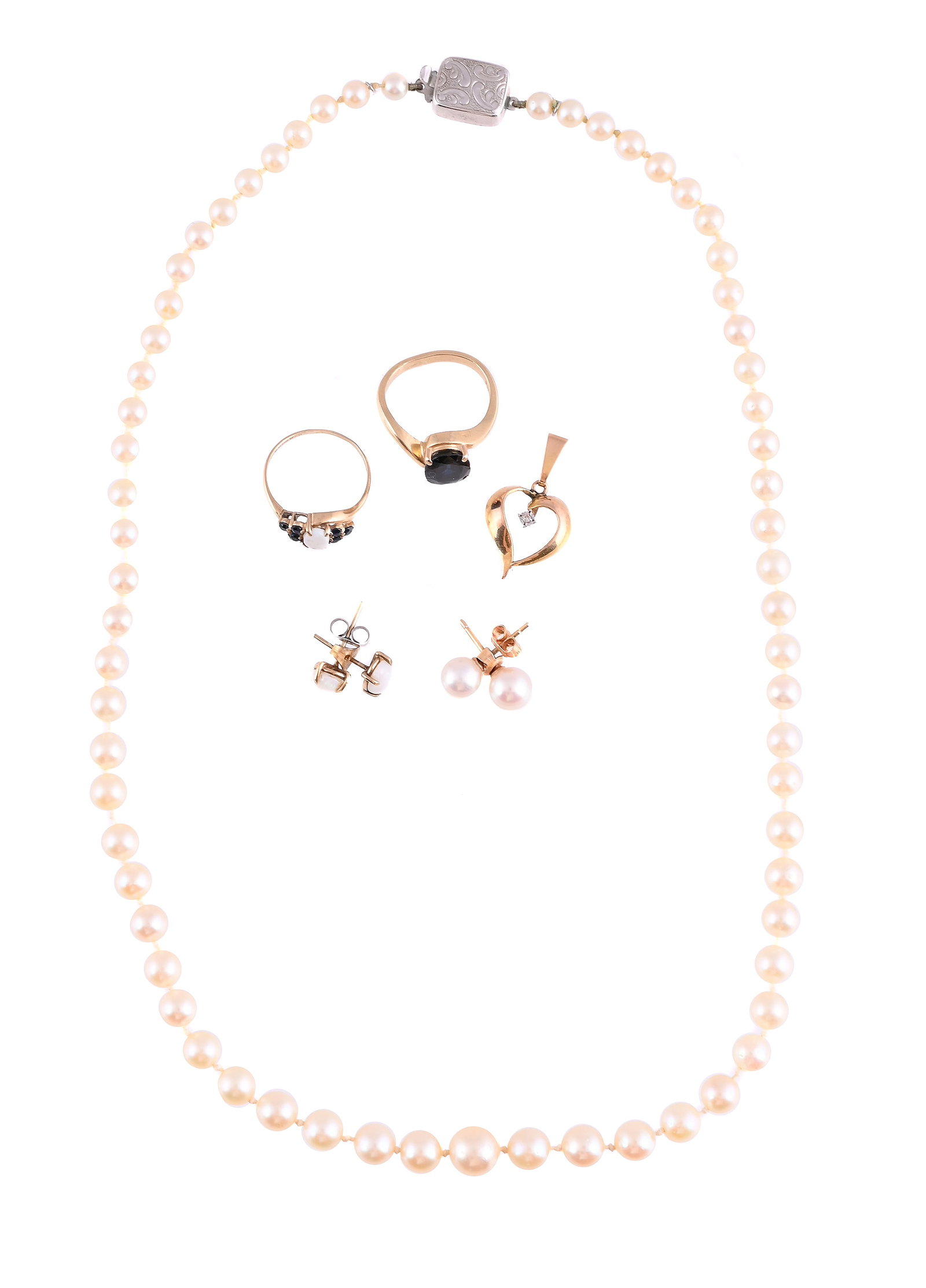 A COLLECTION OF JEWELLERY: A COLLECTION OF JEWELLERY Comprising an oval cut sapphire ring, the shank stamped 14k; a 9ct gold sapphire and opal ring, UK hallmark; a single cut diamond set 9ct gold heart shaped pendant, London