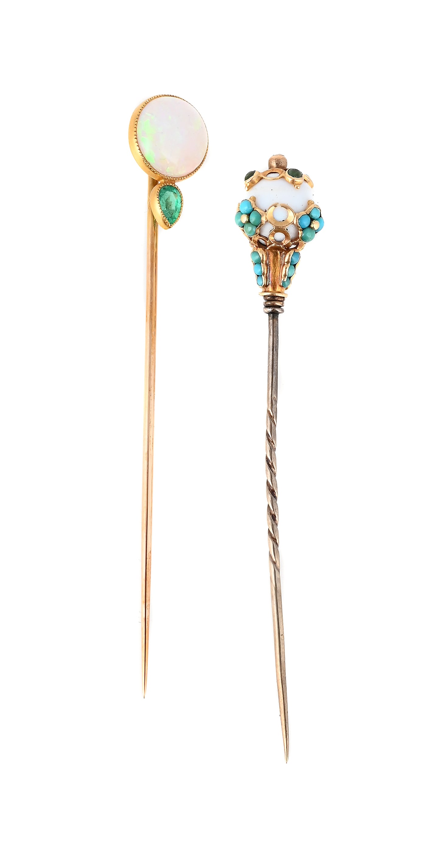 TWO ANTIQUE STICKPINS: TWO ANTIQUE STICKPINS The first with a circular cabochon opal above a pear shaped emerald, circa 1915, stamped 14K, cased by F. Walter Lawrence Inc, 527 5th Ave. New York; the other with a mid 19th