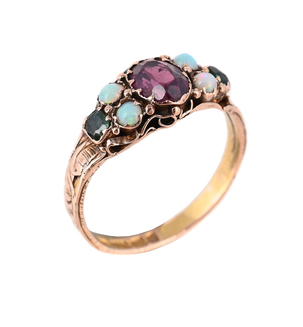 A VICTORIAN GARNET, OPAL AND GARNET TOPPED DOUBLET RING: A VICTORIAN GARNET, OPAL AND GARNET TOPPED DOUBLET RING BIRMINGHAM 1872 The cushion shaped garnet between pairs of circular cabochon opals with garnet topped doublet green pastes, to a 15 carat gold