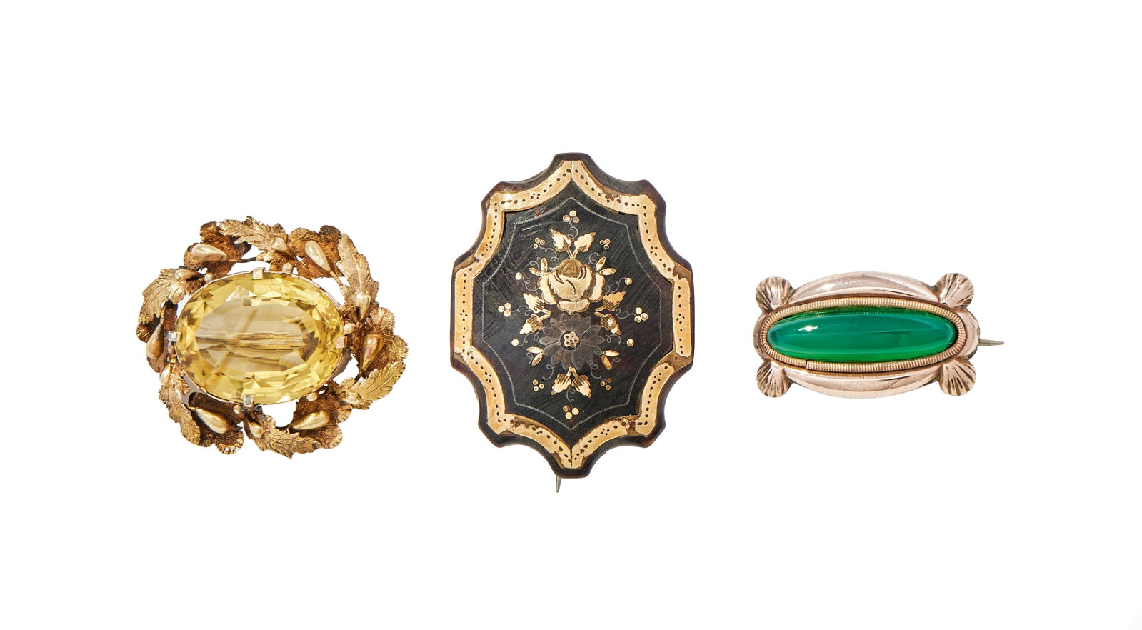 Y THREE VICTORIAN BROOCHES: Y THREE VICTORIAN BROOCHES The first with an oval cut citrine within a texture