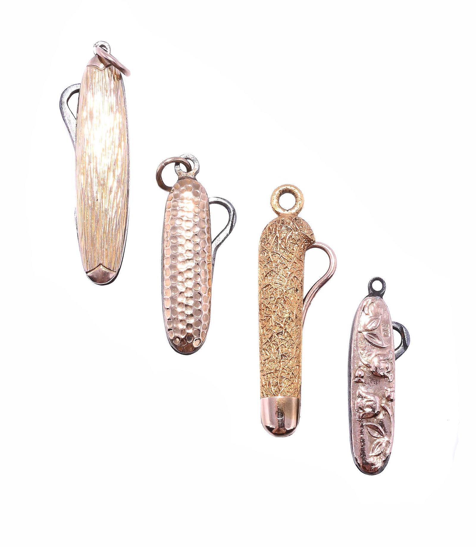 FOUR EARLY 20TH CENTURY BUTTON HOOKS: FOUR EARLY 20TH CENTURY BUTTON HOOKS The first with a textured sleeve, stamped 9ct, MB&Co possibly for Murrle Bennet & Co, steel hook; one with pressed tulip decoration, stamped