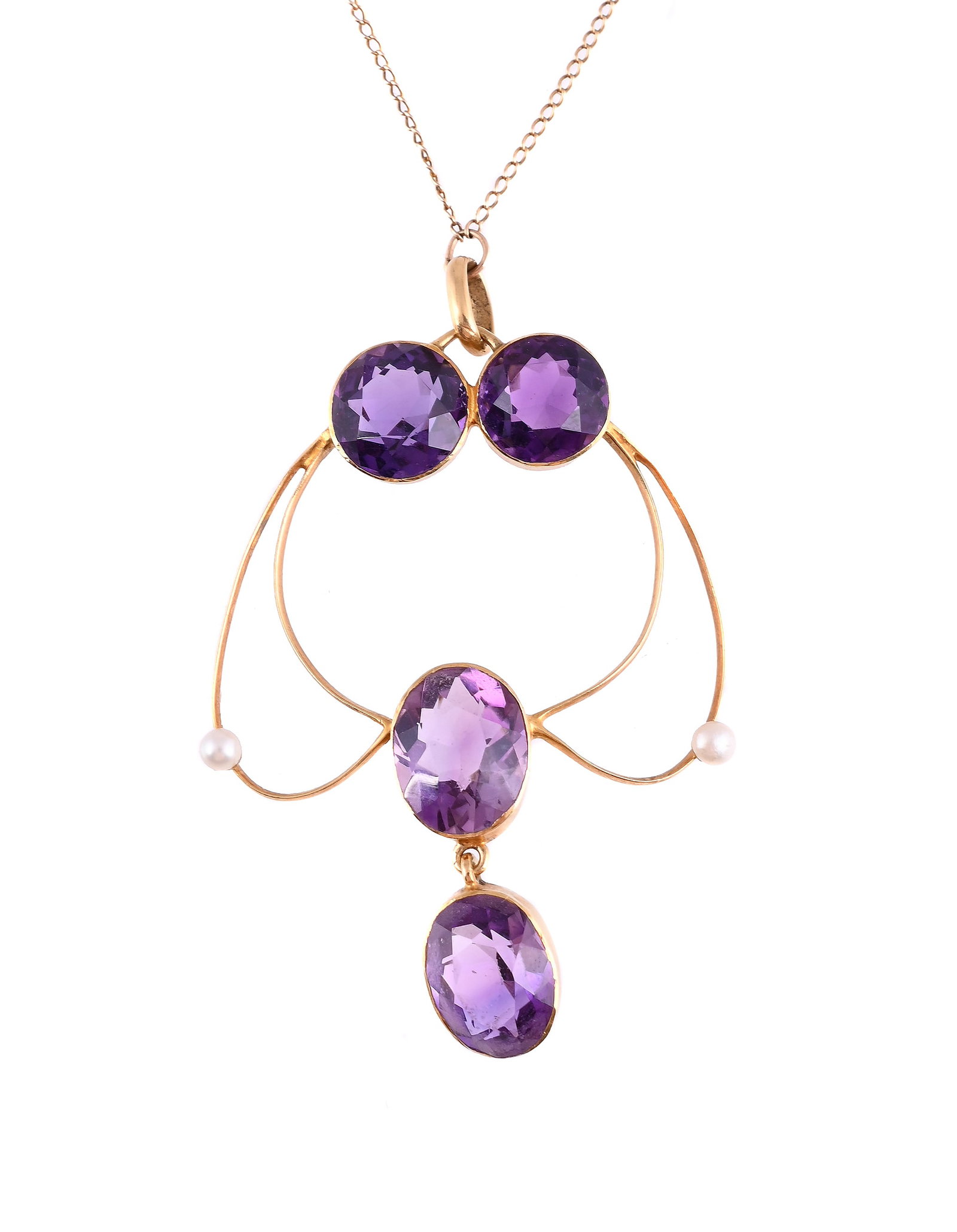 AN AMETHYST AND SEED PEARL SET PENDANT: AN AMETHYST AND SEED PEARL PENDANT The knife edge whiplash openwork pendant set with circular and oval cut amethysts, with seed pearl accents, stamped 750, suspended from a curb link chain