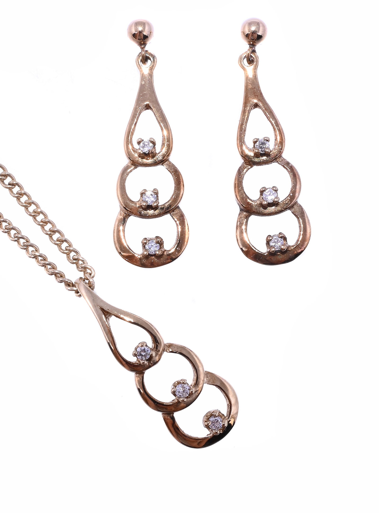 A DIAMOND SET PENDANT AND EARRING SET (1 of 1)