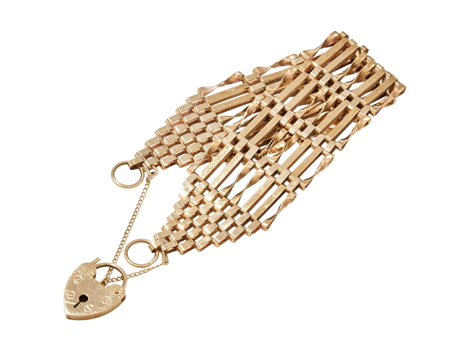 A 9 CARAT GOLD GATE LINK BRACELET, LONDON 1977: A 9 CARAT GOLD GATE LINK BRACELET LONDON 1977 The broad polished gate linking to a heart shaped padlock clasp, UK hallmark Size/dimensions: 18cm long Gross weight: 17.1 grams Condition Report: Some