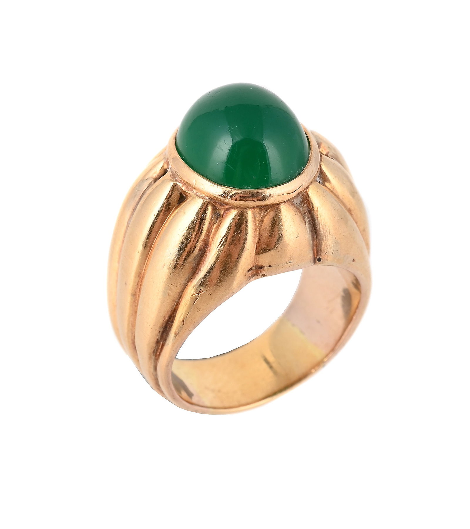 A CHRYSOPRASE DRESS RING: A CHRYSOPRASE DRESS RING The oval cabochon chrysoprase within a reeded setting, unmarked Size/dimensions: ring size M 1/2 Gross weight: 15.3 grams Condition Report: The ring has