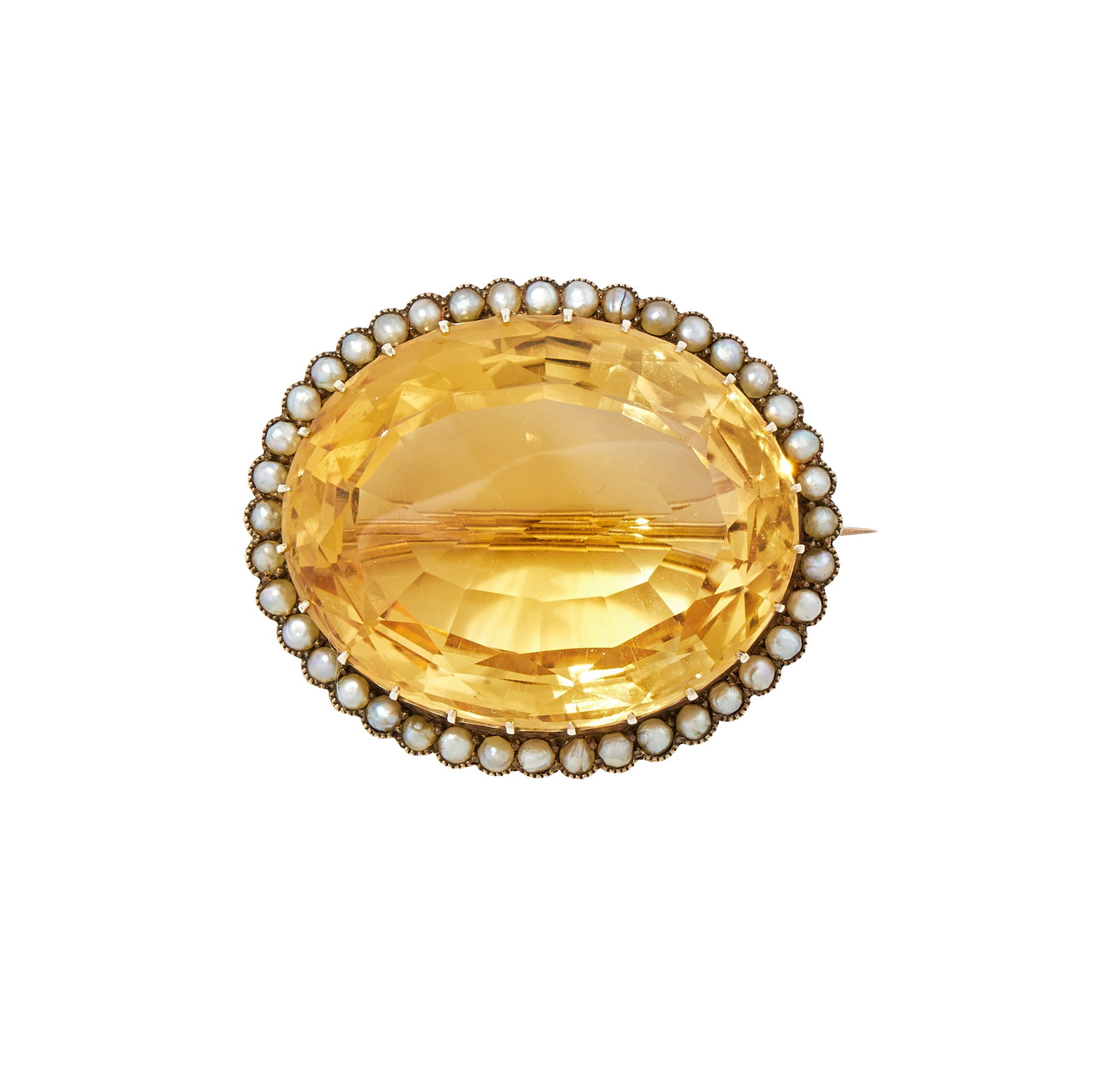 A CITRINE AND HALF PEARL BROOCH: A CITRINE AND HALF PEARL BROOCH The oval cut citrine within a surround of half pearls, unmarked Size/dimensions: 3.8cm wide Gross weight: 20.6 grams Condition Report: The brooch has some light
