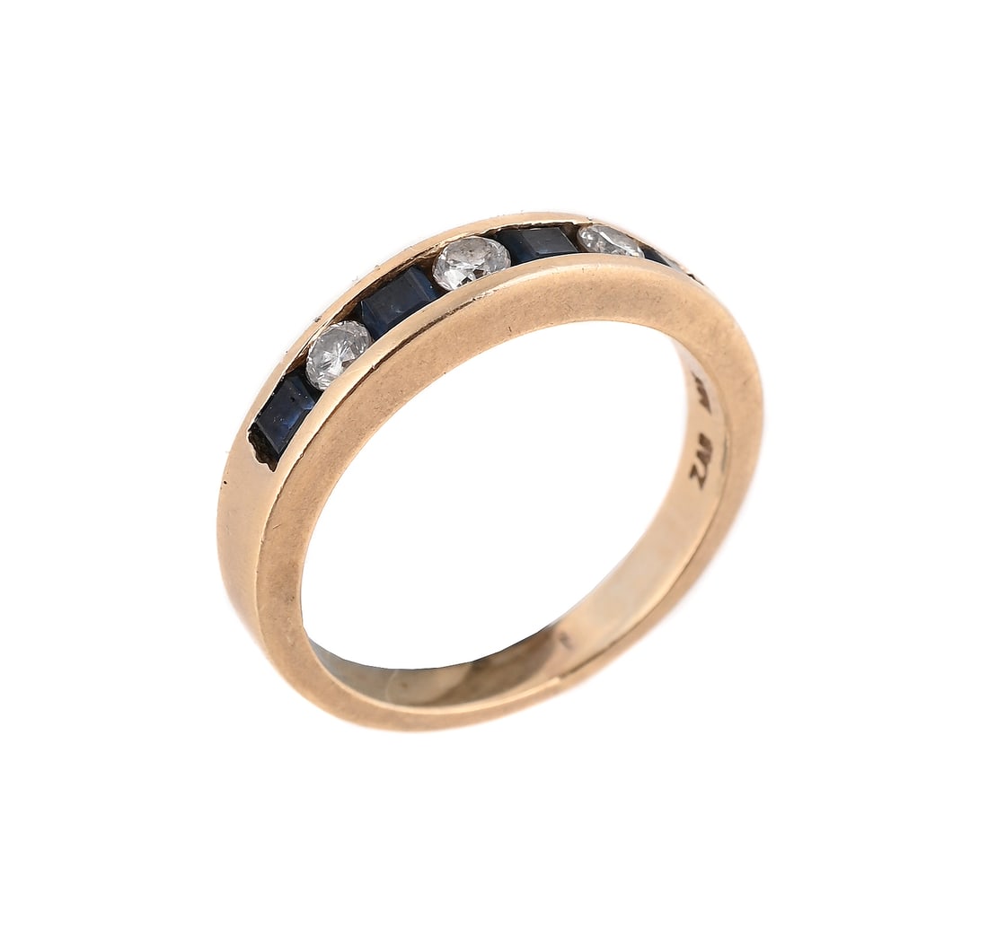 A SAPPHIRE AND DIAMOND SEVEN STONE RING: A SAPPHIRE AND DIAMOND SEVEN STONE RING Channel set with alternating square cut sapphires and brilliant cut diamonds, stamped 14K Size/dimensions: ring size J Gross weight: 2.9 grams Condition