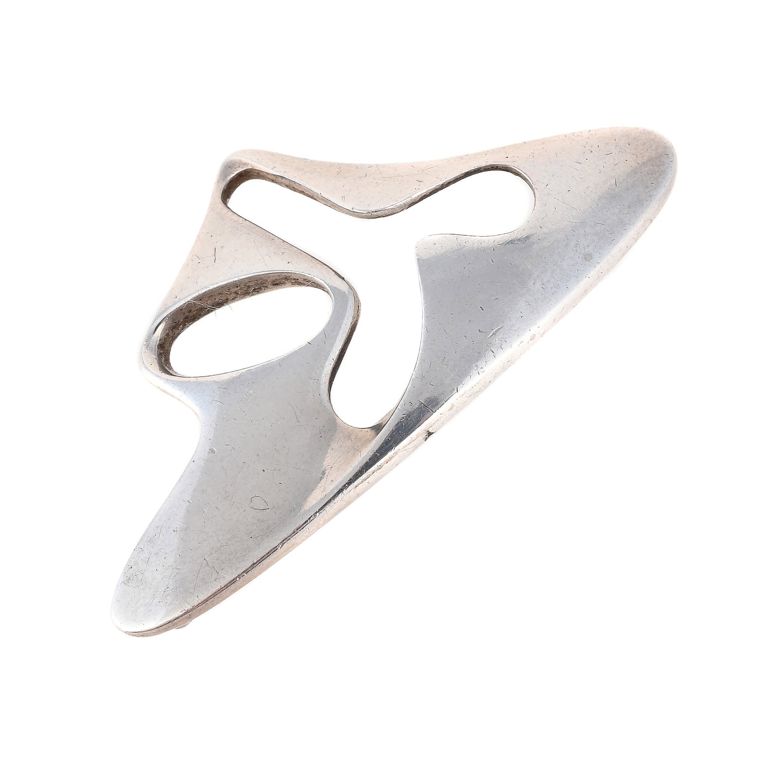 HENNING KOPPEL FOR GEORG JENSEN, A SILVER ABSTRACT BROOCH: HENNING KOPPEL FOR GEORG JENSEN, A SILVER ABSTRACT BROOCH The shaped triangular panel with pierced detail, maker's mark, stamped Sterling Norway, numbered 325