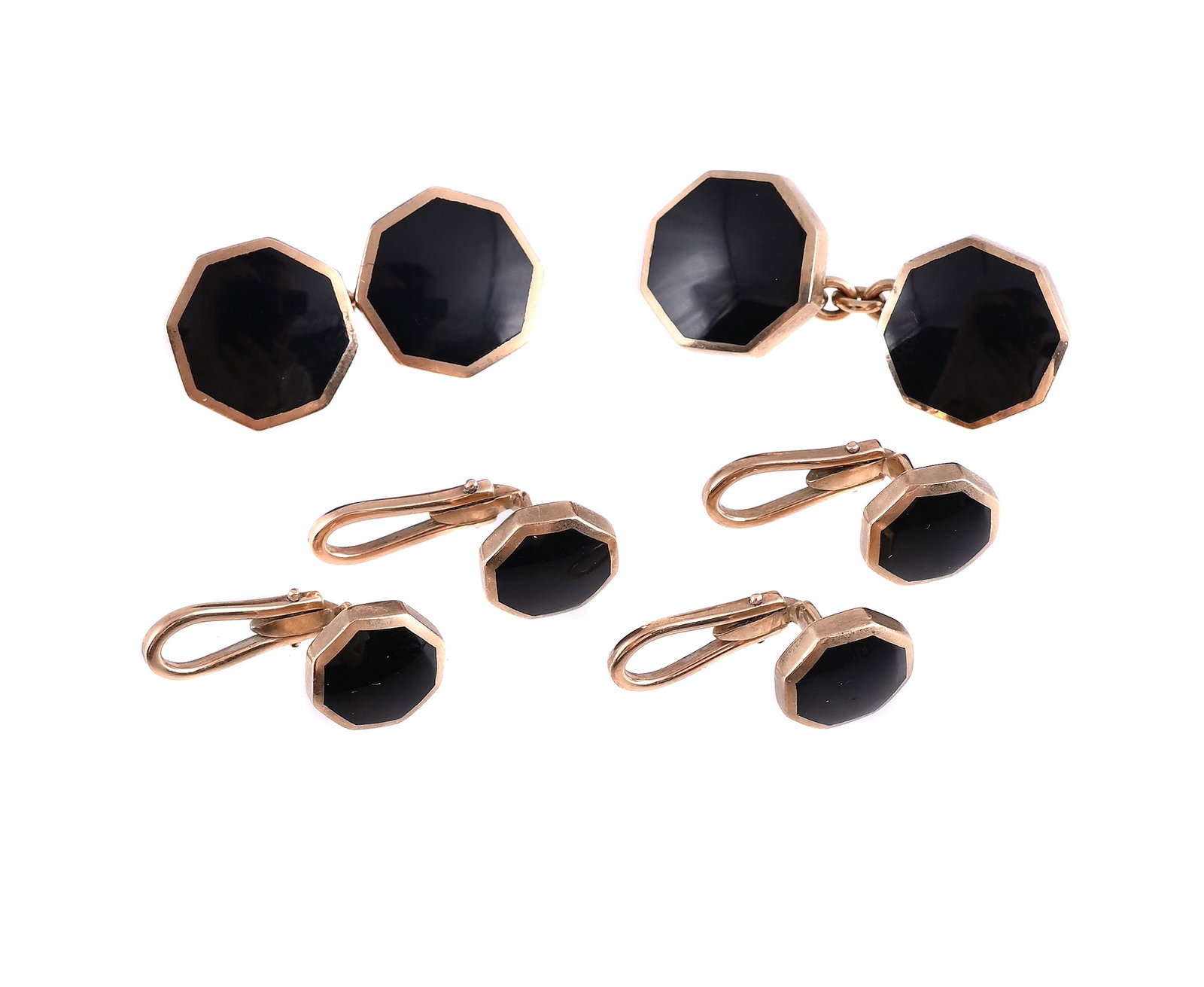 A BLACK ENAMEL DRESS SET, SHEFFIELD 2000: A BLACK ENAMEL DRESS SET SHEFFIELD 2000 The octagonal 9ct gold terminals with polished black enamel panels, to belcher link connectors, together with matching dress studs, UK hallmark, maker's mark