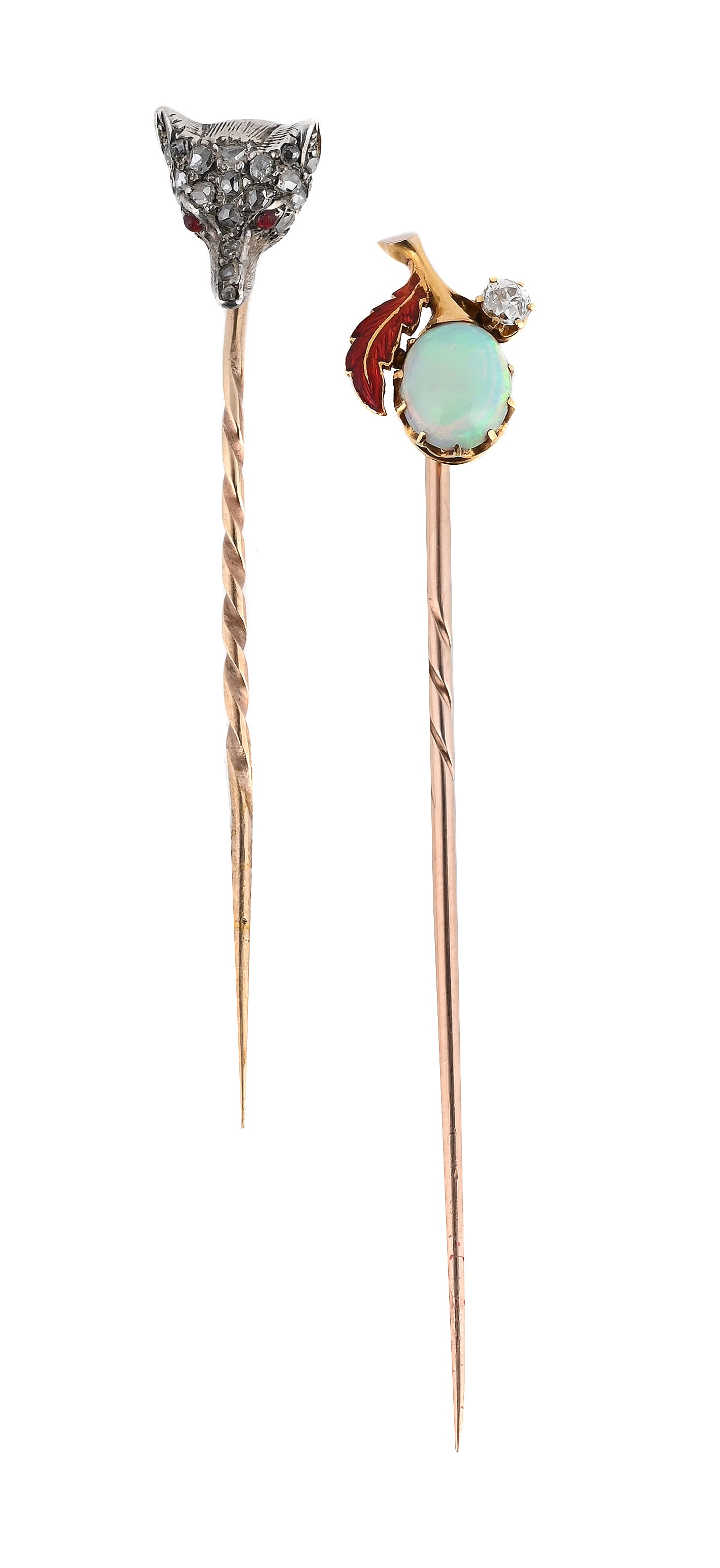 TWO EARLY 20TH CENTURY STICKPINS: TWO EARLY 20TH CENTURY STICKPINS The first with a red enamelled leaf to an oval cabochon opal 'fruit' with an old mine cut diamond accent; and a fox mask terminal set with rose cut diamonds