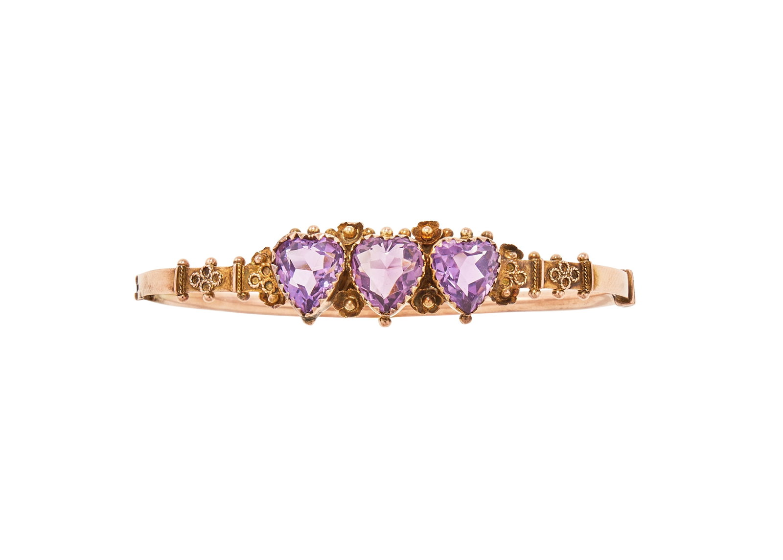 A LATE VICTORIAN 9 CARAT GOLD AMETHYST HINGED BANGLE (1 of 2)