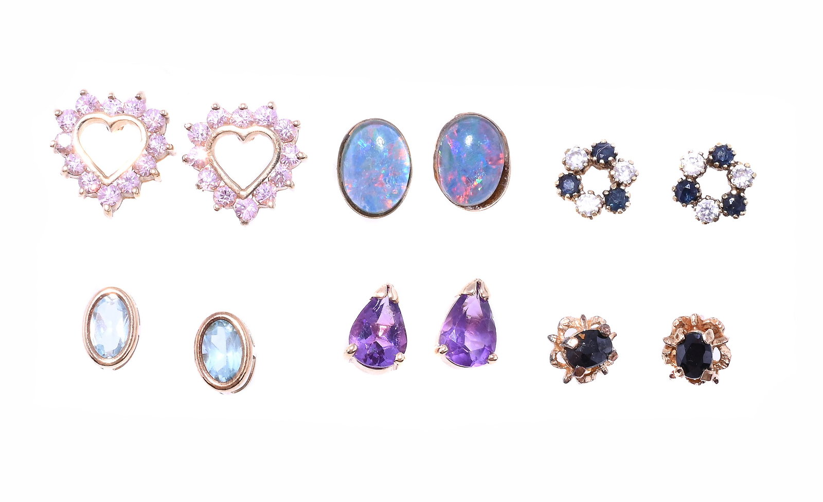 A COLLECTION OF GEM SET EARRINGS: A COLLECTION OF GEM SET EARRINGS Including a pair of opal doublet stud earrings, stamped 9ct; a heart shaped pair set with pink stones, 9 carat gold import mark; a pair of small circlets