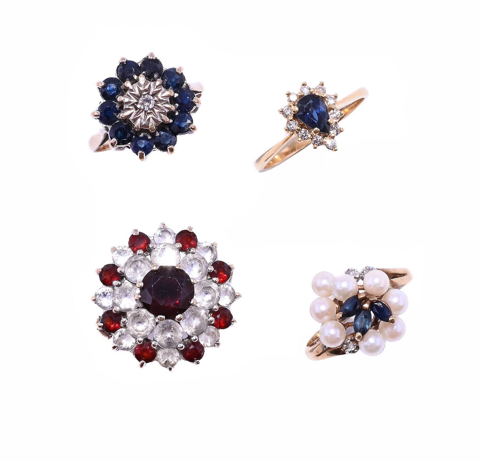 A GROUP OF CLUSTER RINGS: A GROUP OF CLUSTER RINGS The first a pear shaped sapphire in a brilliant cut diamond surround, mounted in 18ct gold, hallmarked Birmingham 1990; the second with three marquise cut
