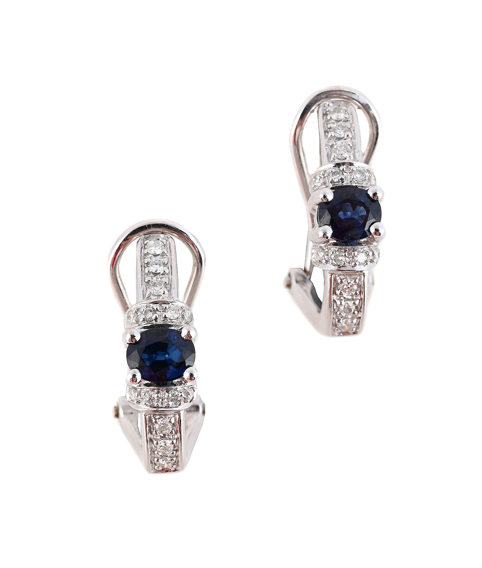 A PAIR OF SAPPHIRE AND DIAMOND EARRINGS: A PAIR OF SAPPHIRE AND DIAMOND EARRINGS Each oval cut sapphire claw set between brilliant cut diamond bands, post and clip fittings, stamped 585 14K Size/dimensions:1.9cm long Gross weight: 5.2