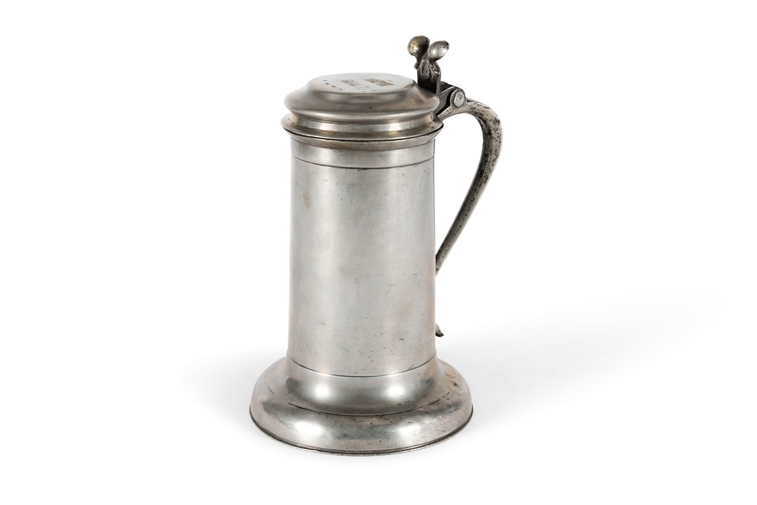 A CHARLES II PEWTER BEEFEATER FLAGON, CIRCA 1670: A CHARLES II PEWTER BEEFEATER FLAGON CIRCA 1670The swan neck handle with ownership triad S over R E, worn hallmarks to lid and unidentified clear touchmark inside base possibly a female mermaid with m