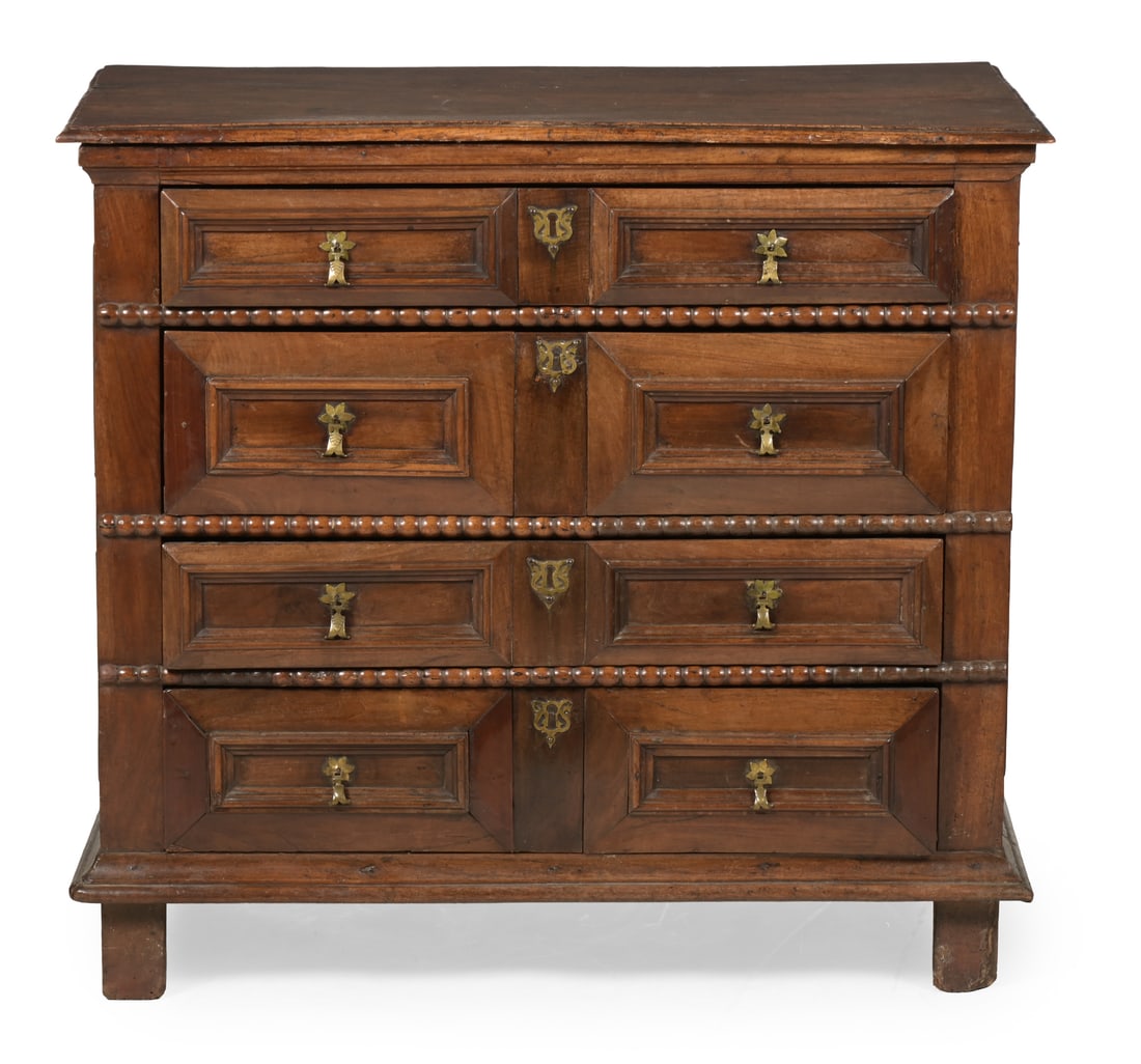 A CHARLES II WALNUT AND ELM CHEST OF DRAWERS, CIRCA 1670 (1 of 3)