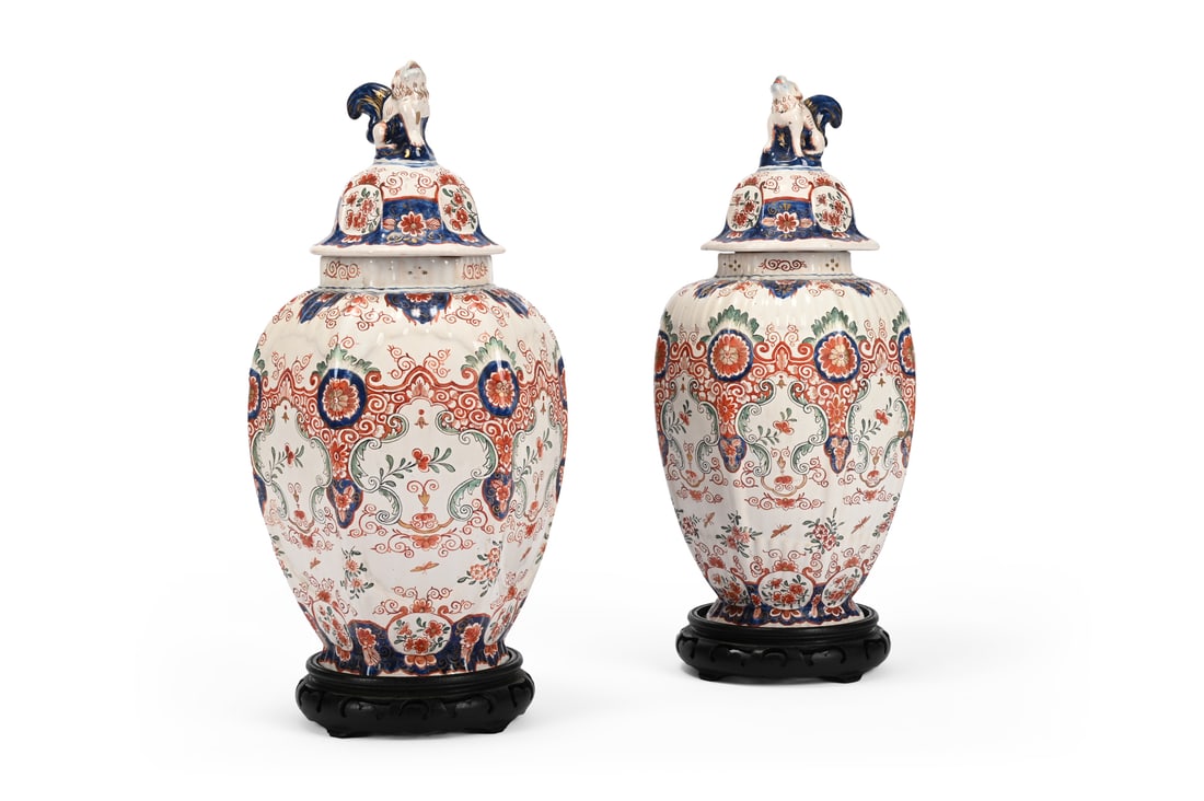 A PAIR OF DELFT POLYCHROME HEXAGONAL SECTION VASES AND COVERS, LATE 19TH CENTURY (1 of 5)